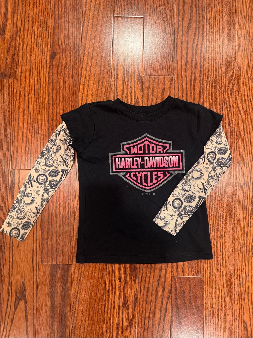Harley-Davidson Black Tee with Pink Logo and Cream Graphic Sleeves